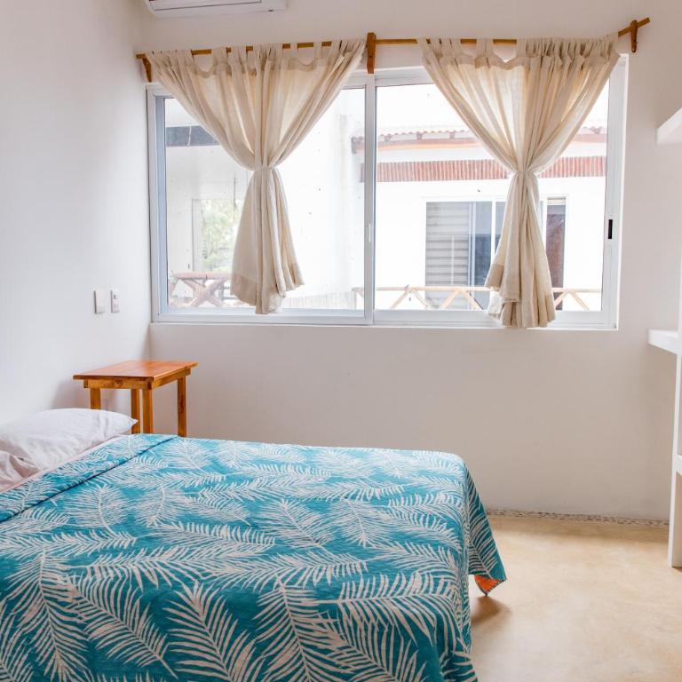 CASA GUAJE 5min to Beach Bacocho and Coral 3Floor House 6 Bedrooms all with AC 8 beds up to 16 Guests Wifi starlink - Apartamento - 11