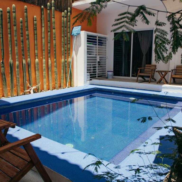CASA GUAJE 5min to Beach Bacocho and Coral 3Floor House 6 Bedrooms all with AC 8 beds up to 16 Guests Wifi starlink - Apartamento - 22