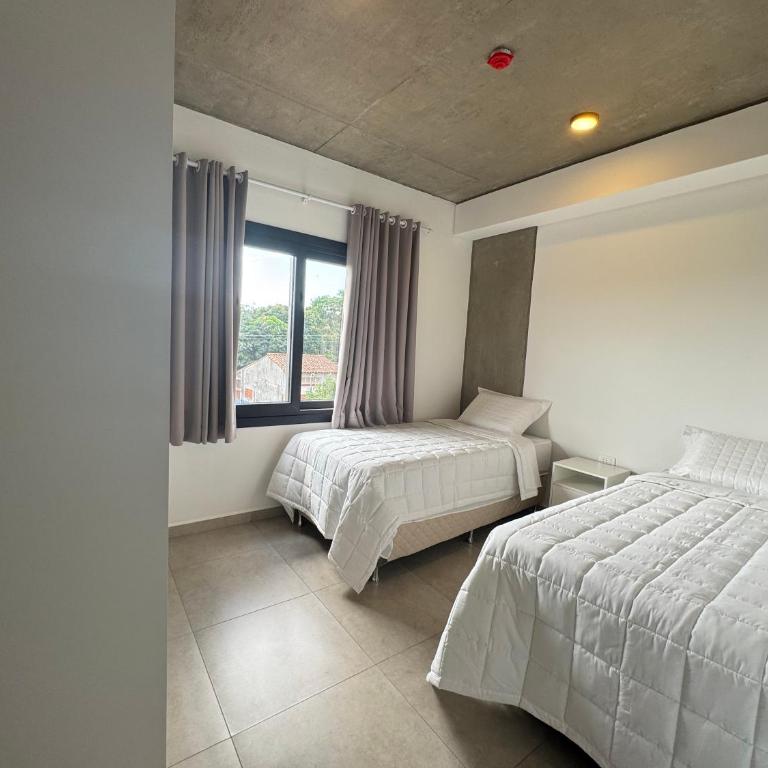 Ideal para vacacionar a pasos de la playa San José de Encarnación - Two-Bedroom Apartment - 36