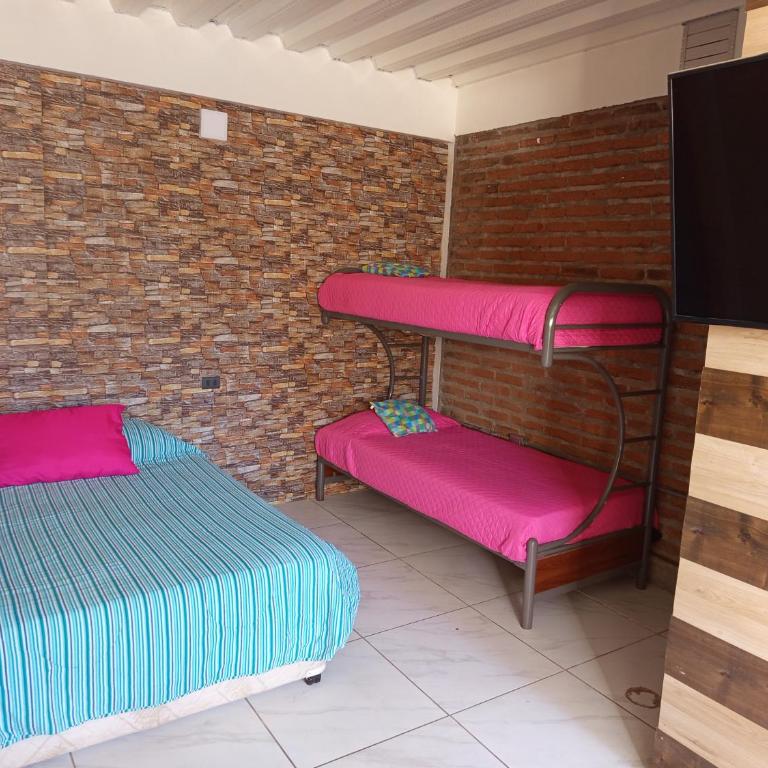 HOSTEL SAKAR Quintero Beach - Habitación Cuádruple - vistas al jardín - 6