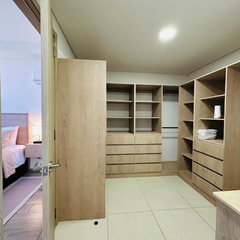 Modern 2BR Condo in Providencia, City Views, Pool & Gym - Two-Bedroom Deluxe Apartment with Balcony - 12