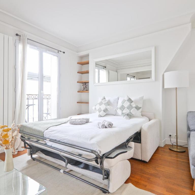 Haussmannien lumineux avec balcon proche Montmartre - Appartement 1 Chambre - 36