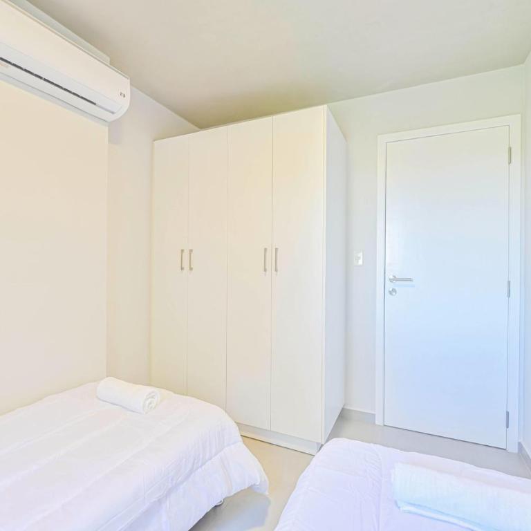 Elegant 2-bedroom space with a pool, gym, and free parking - Two-Bedroom Apartment - 17