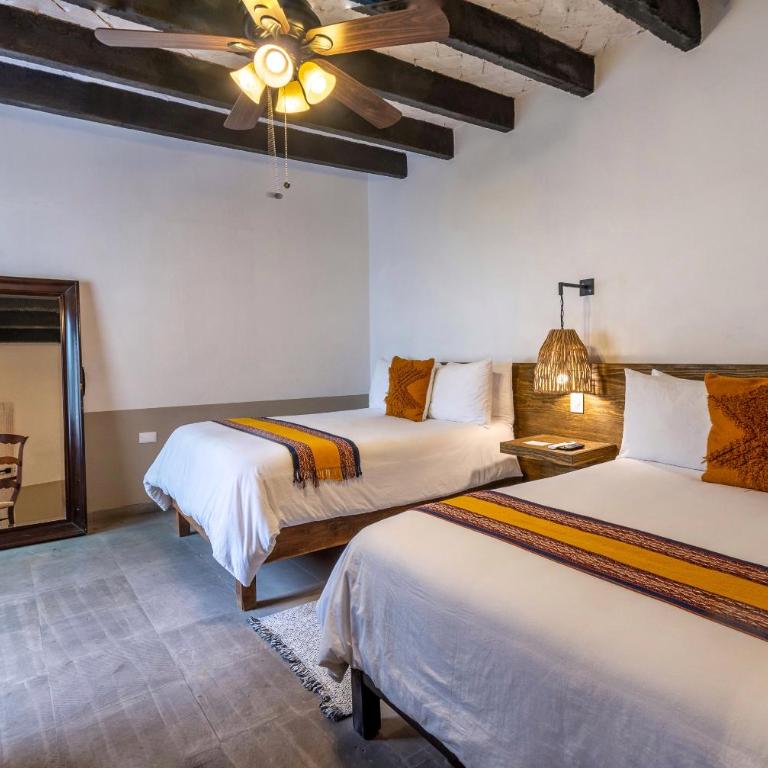 Casa Yuca Hotel - Habitación Cuádruple Confort - 1