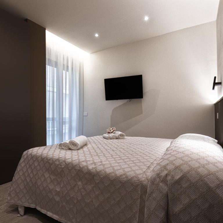 Valentino Rooms - Camera Quadrupla Deluxe - 8