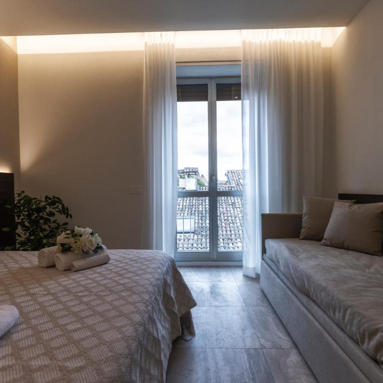 Valentino Rooms - Camera Tripla Deluxe - 9