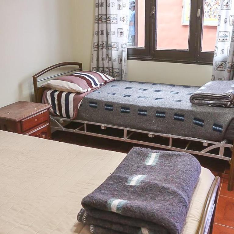 Hospedaje Casa Gaite - Cama individual en habitación compartida - 9