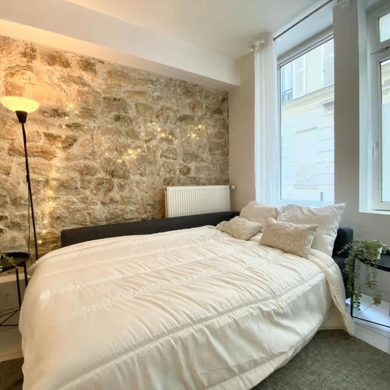 Suite 100 Belmondo Cosy Apartment Paris Center - Appartement - 16
