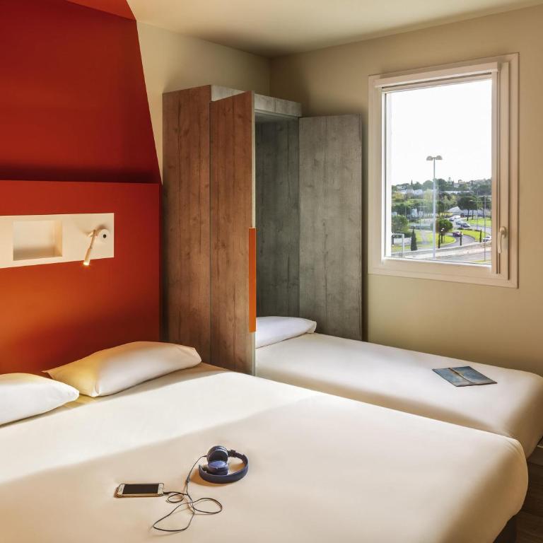 Ibis Budget Montpellier Nord Euromédecine - Chambre Triple avec 1 Lit Double et 1 Lit Simple - 1