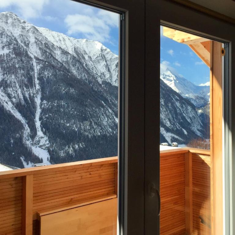 Chalet Magda-Lena - Apartment mit Blick auf die Berge - 12