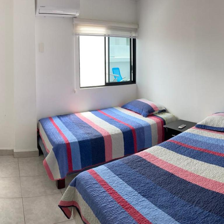 Casa vacacional manta - Apartamento de 3 dormitorios - 11