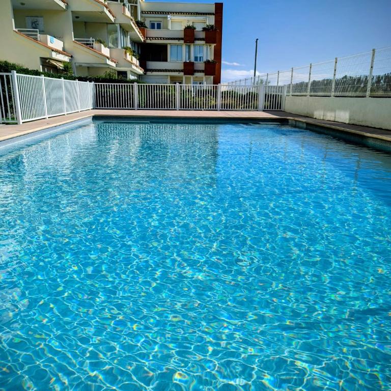 Studio Vue mer, Piscine, Wifi, Climatisation, Parking privé, Terrasse 1ère ligne - La Coulée Douce - Appartement - Vue sur Mer - 26