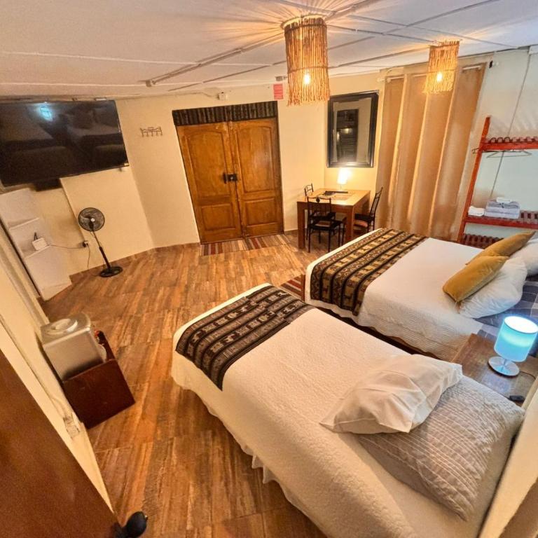 Hostal Katarpe - Habitación Familiar con vistas a la montaña - 1