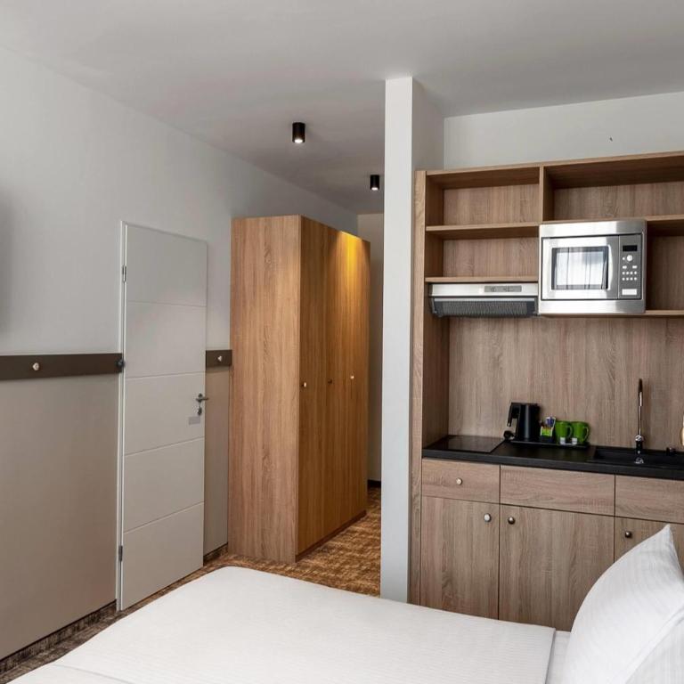 Wyndham Garden Munich Messe - Familienzimmer - Nichtraucher - 9