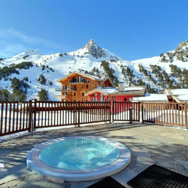 ARC 1950 - Appartement 08 personnes - Départ ski aux pieds - Sauna, Hammam, Jacuzzi, Salle de fitness, Piscine extérieure chauffée - Two-Bedroom Apartment with Terrace - 19