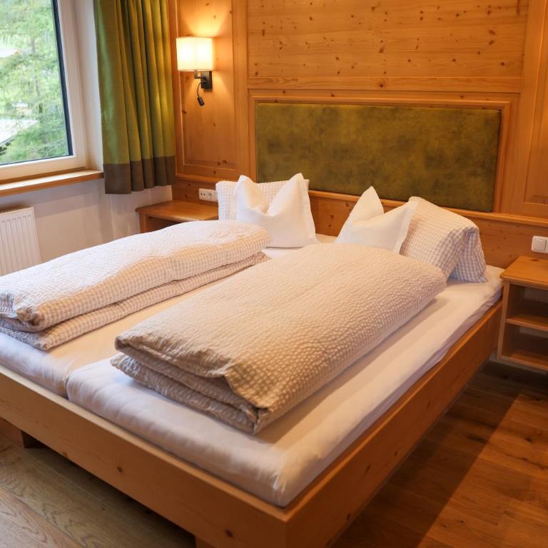 Pension Muggengrat - Doppelzimmer mit Zustellbett - 21