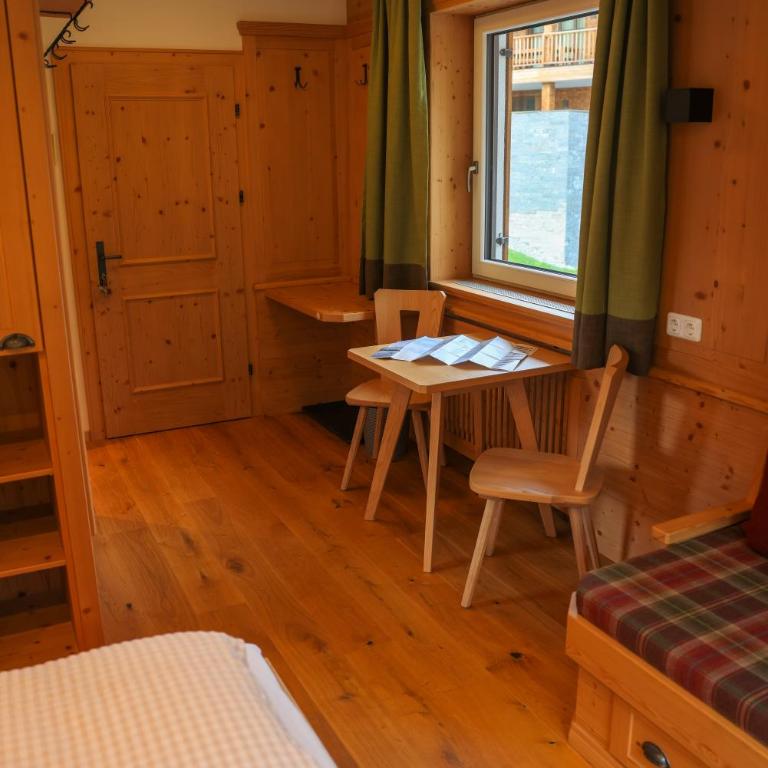 Pension Muggengrat - Doppelzimmer mit Zustellbett - 20