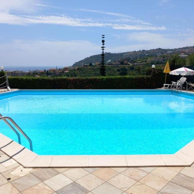 Bilocale vista mare con giardino privato e piscina - One-Bedroom Apartment - 1