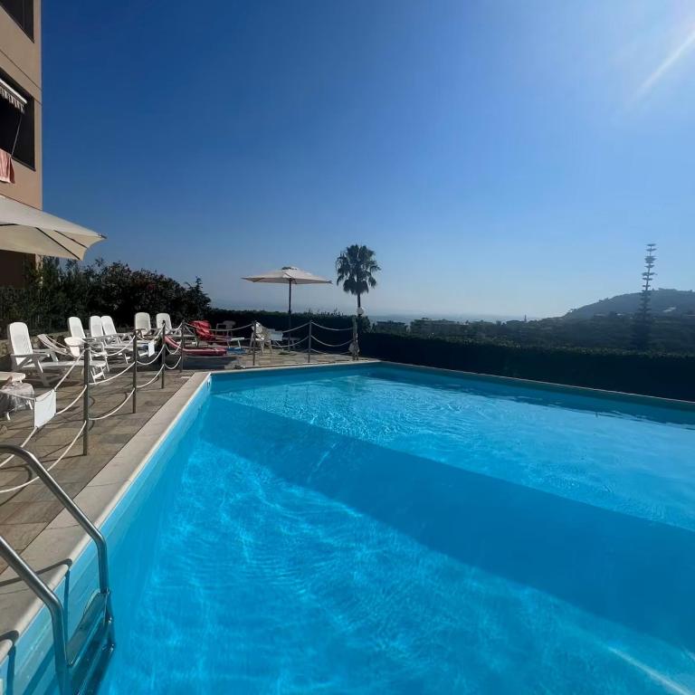 Bilocale vista mare con giardino privato e piscina - One-Bedroom Apartment - 2