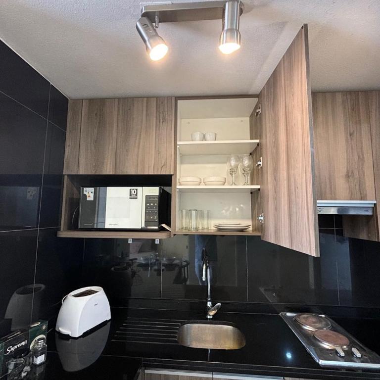Departamento estudio en Macul hasta 3personas, a pasos del metro incluye estacionamiento - Studio Apartment - 17
