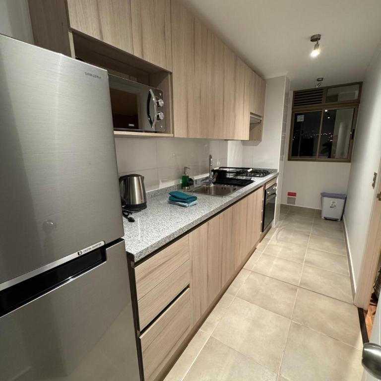 Lindo y espacioso departamento con hermosa vista - Three-Bedroom Apartment - 14