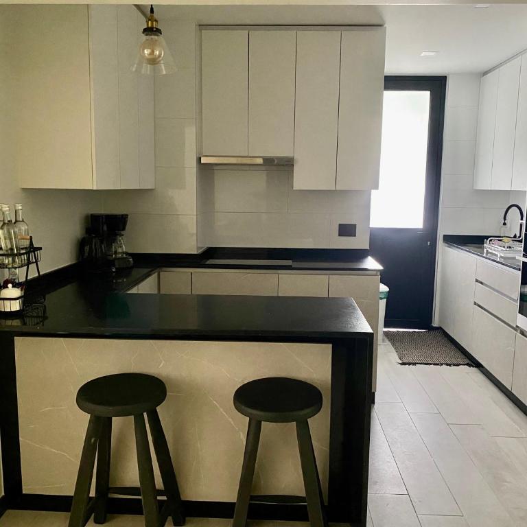 Acogedor departamento de lujo - Three-Bedroom Deluxe Apartment - 26