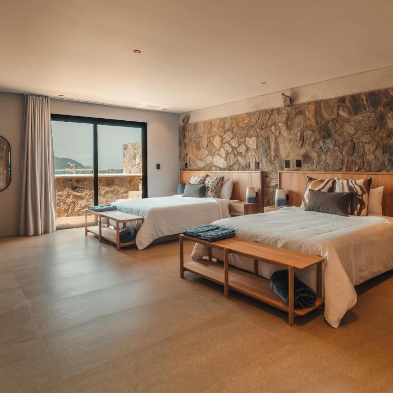 Perla Roca Hotel Boutique - Beach Front - Quadruple Room with Sea View - 1
