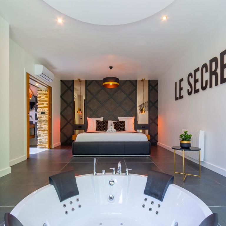 Nuit confort avec Balnéo XXL privative et Climatisation - Maison 1 Chambre - 13