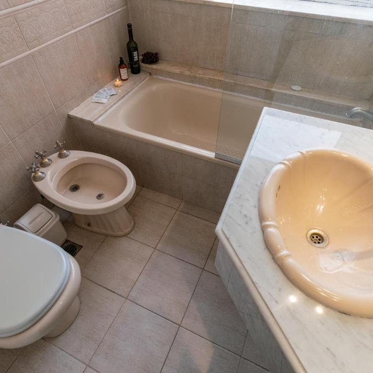 cerca de la estación retiro con cochera, pileta y sauna - Apartamento de 1 dormitorio - 25