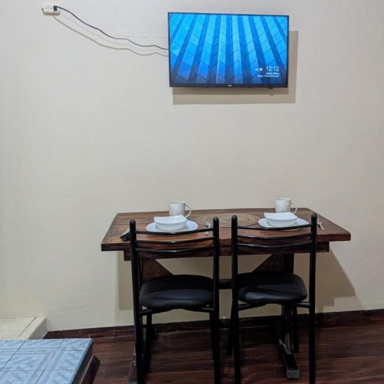 Suite Práctica de Dos Ambientes Cocina y Sofá Cama - One-Bedroom Apartment - 1