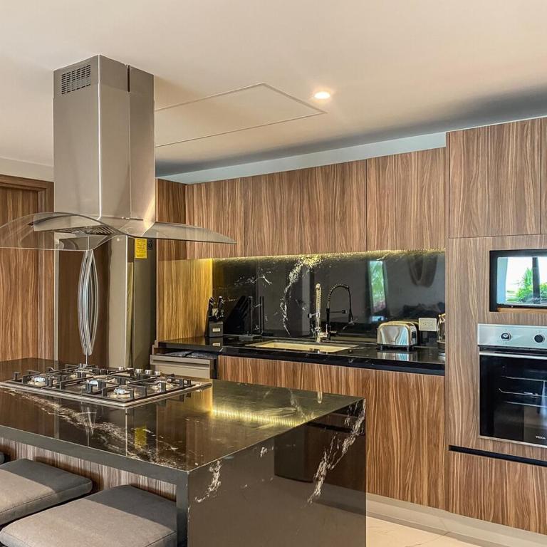 Luxury Retreat in Puerto Cancun with Rooftop Pool - Three-Bedroom Premium Apartment - 2