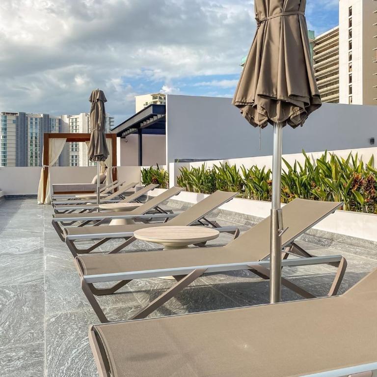 Luxury Retreat in Puerto Cancun with Rooftop Pool - Three-Bedroom Premium Apartment - 33