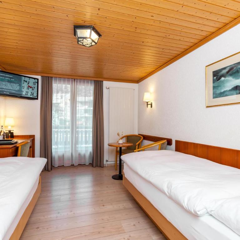 Alpenblick - Doppelzimmer mit 2 Einzelbetten und Terrasse - 3