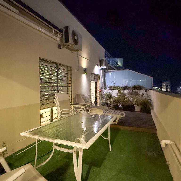 Penthouse con parrillero, terraza y estufa a leña - Two-Bedroom Apartment - 23
