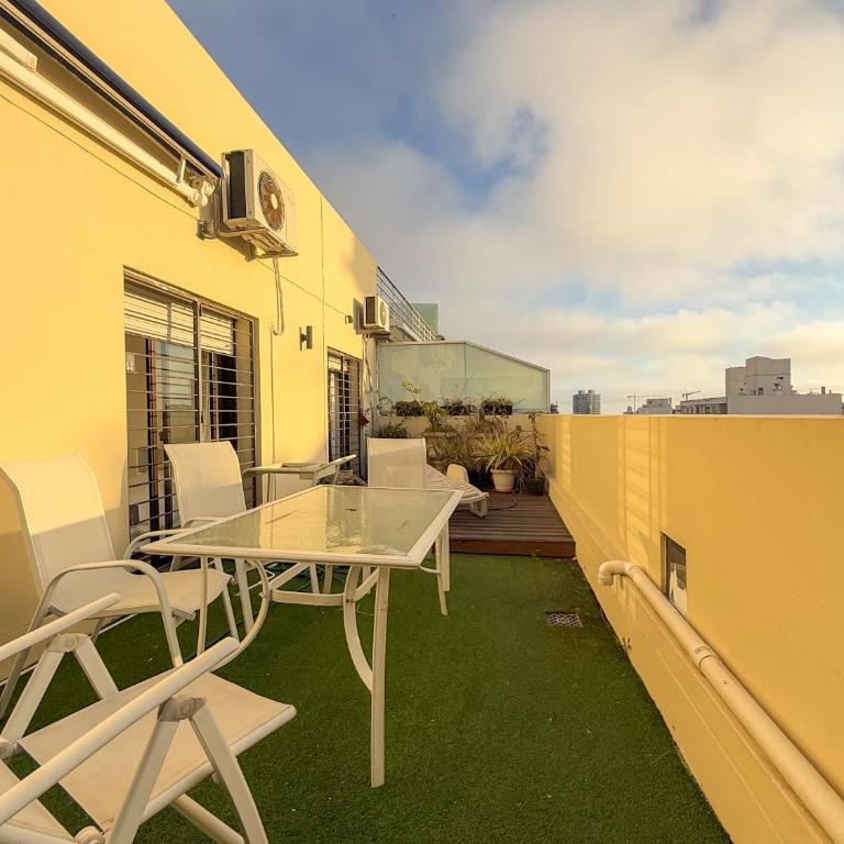 Penthouse con parrillero, terraza y estufa a leña - Two-Bedroom Apartment - 7