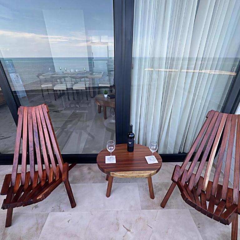 Beachfront 2BR 2BA Condo w Balcony, Ocean Views - Two-Bedroom Apartment with Balcony and Sea View - 21