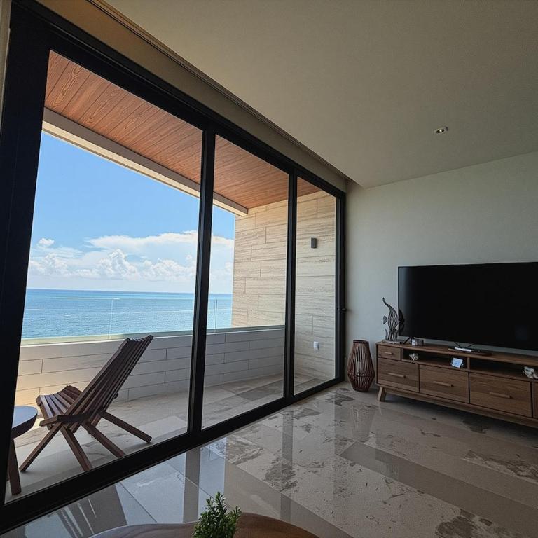 Beachfront 2BR 2BA Condo w Balcony, Ocean Views - Two-Bedroom Apartment with Balcony and Sea View - 52