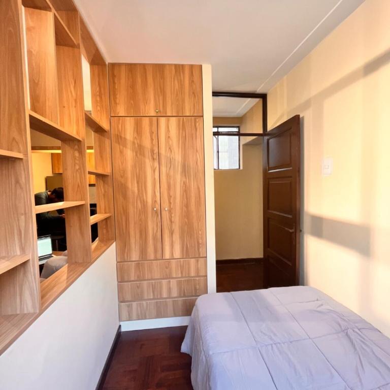 Céntrico Dpto Puca Lima a 2 cuadras de Hospital Rebagliati y Real Plaza Salaverry - Two-Bedroom Apartment with Garden View - 10