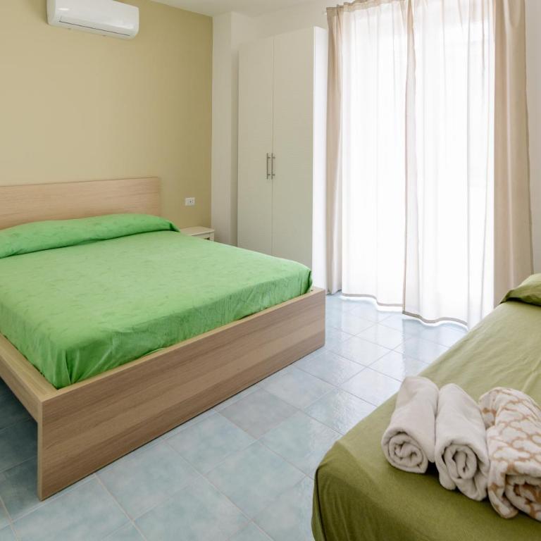 Greco b&b - Camera Familiare con Vista Mare Laterale - 3