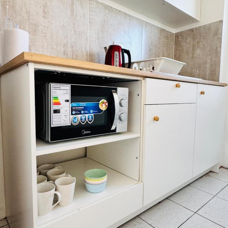 Moderno 3 dormitorios, cerca Movistar arena, Estadio Nacional, Fantasilandia, parking arriendo diario, cocina completa - Three-Bedroom Apartment - 21