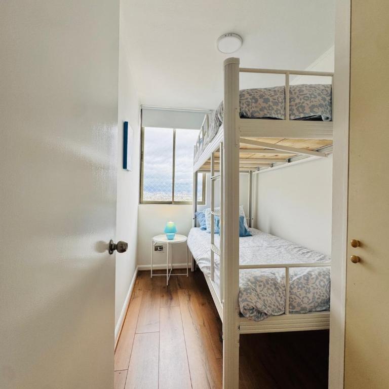 Moderno 3 dormitorios, cerca Movistar arena, Estadio Nacional, Fantasilandia, parking arriendo diario, cocina completa - Three-Bedroom Apartment - 9