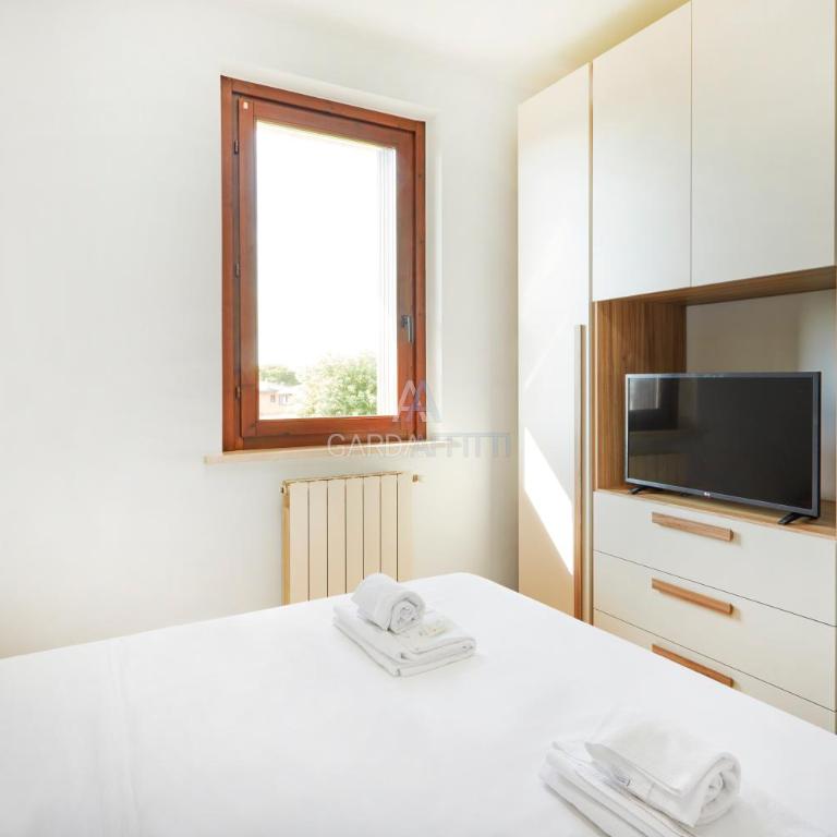 Giove Apartment - piscina e natura a Sirmione - Appartamento con 1 Camera da Letto e Terrazza - 18