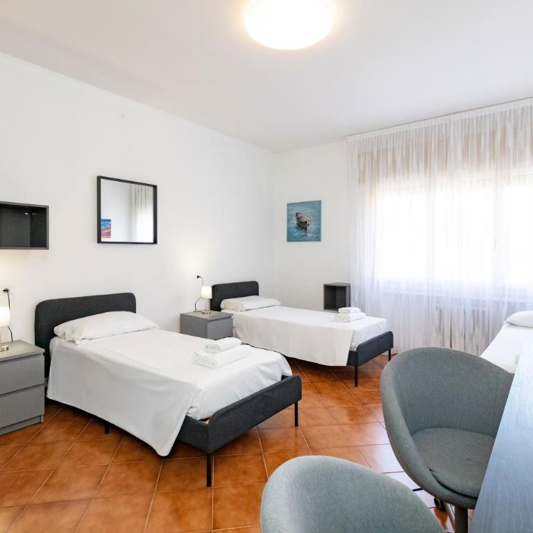 Fucini Rooms Mestre Posizione strategica e comfort moderno - Triple Room with Shared Bathroom - 4