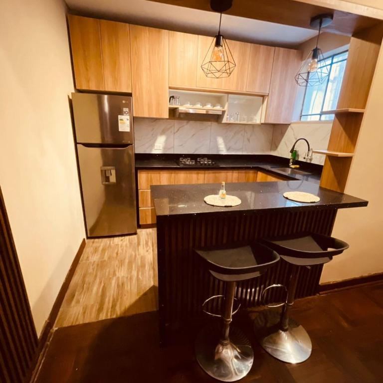 Céntrico Dpto Puca Lima a 2 cuadras de Hospital Rebagliati y Real Plaza Salaverry - Two-Bedroom Apartment with Garden View - 59
