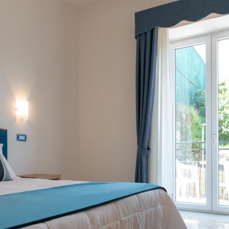 Hotel Britannia - Camera Matrimoniale con Balcone e Vista Giardino - 1