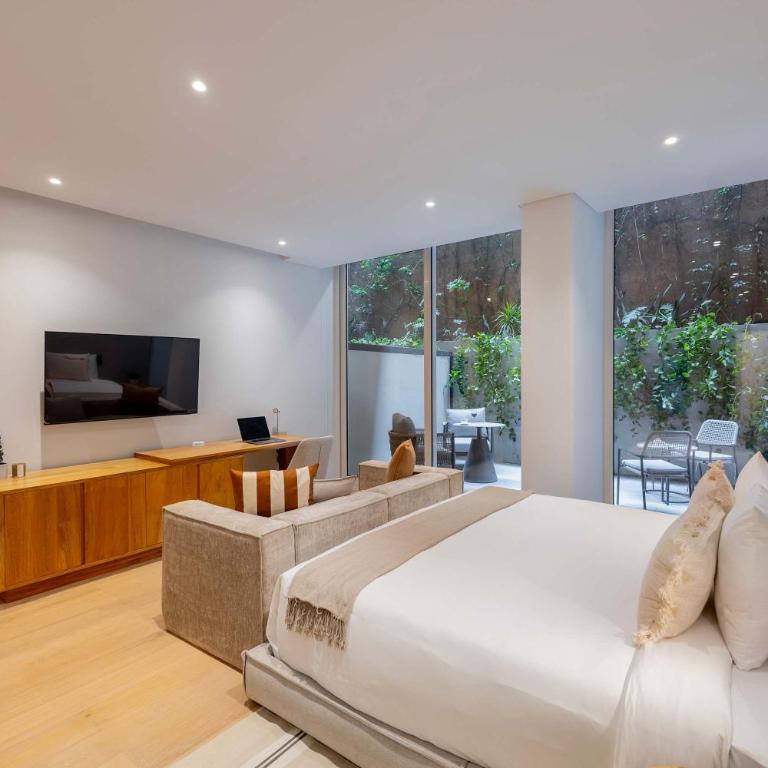T02 Capitalia Cozy Studio with Gym and Rooftop Retreat - Apartamento - 15