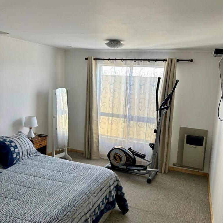 Dulce hogar en Puerto Natales - Three-Bedroom House - 14