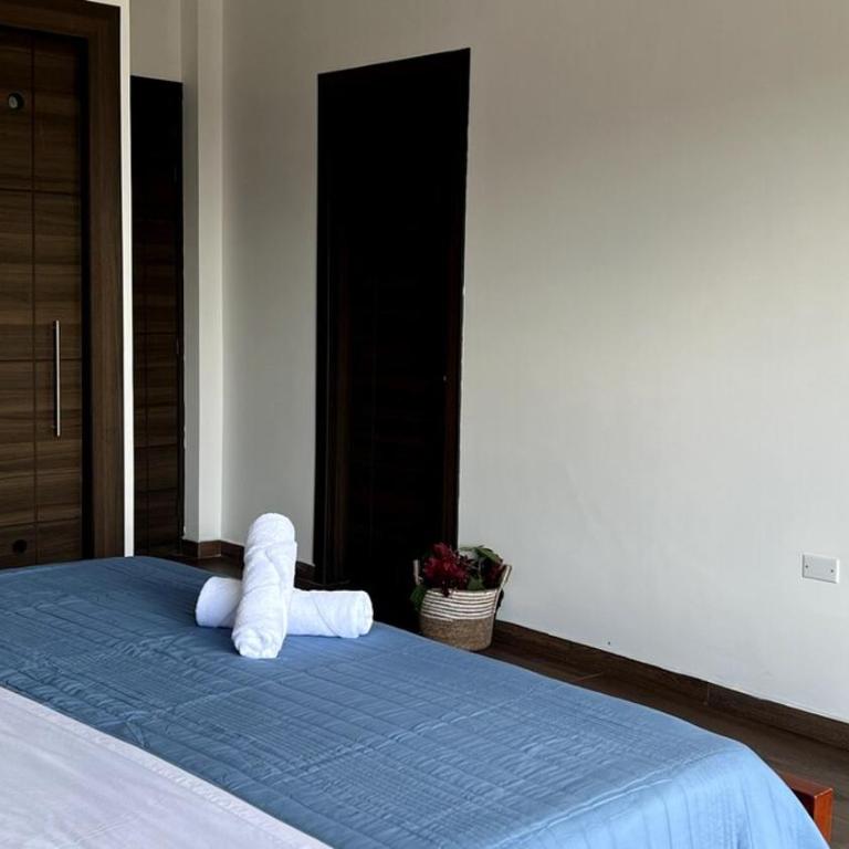 Casa Familiar Moderna - Three-Bedroom House - 55