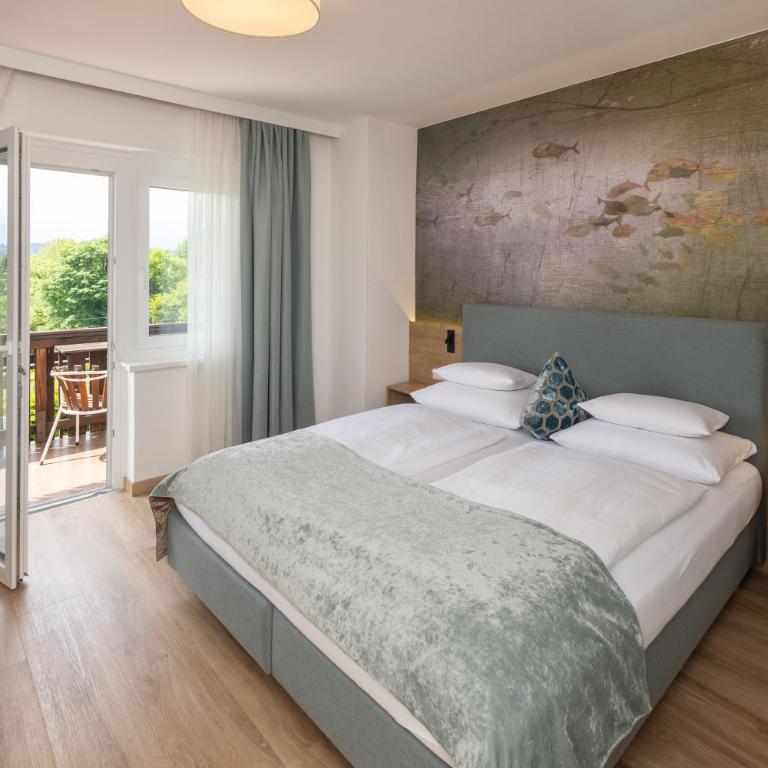 Hotel Garni Wurzer - Doppelzimmer mit Balkon und Seeblick - 2