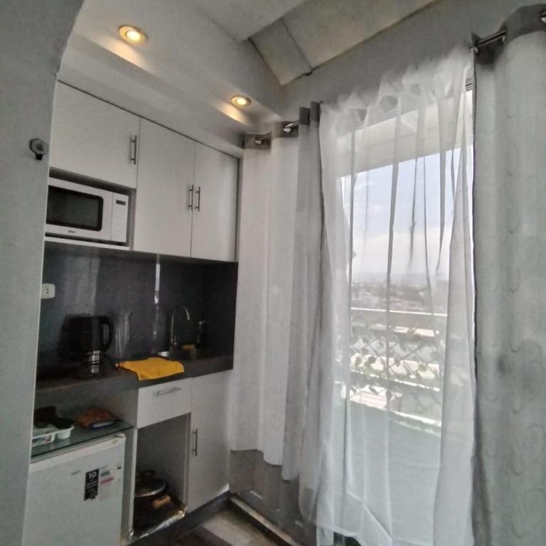 Estudio Funcional con Cama Queen, Cocina y Terraza - Apartamento de 1 dormitorio - 6